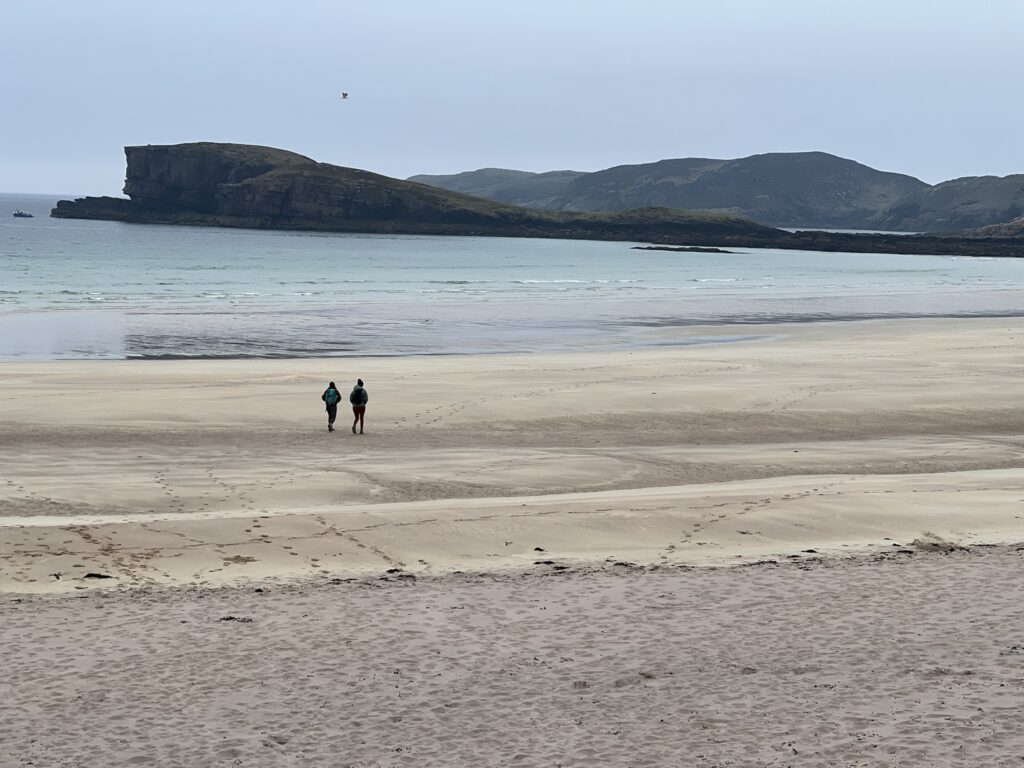 Couple enjoying Oldmoreshore Beach